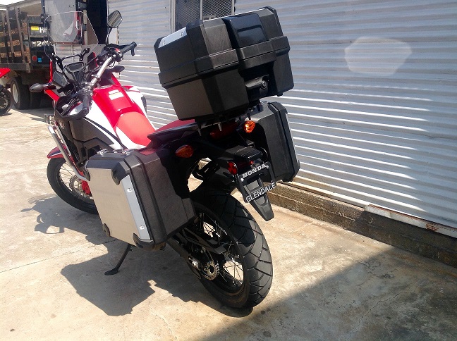 The rear of a Honda Africa twin motorcycle.
